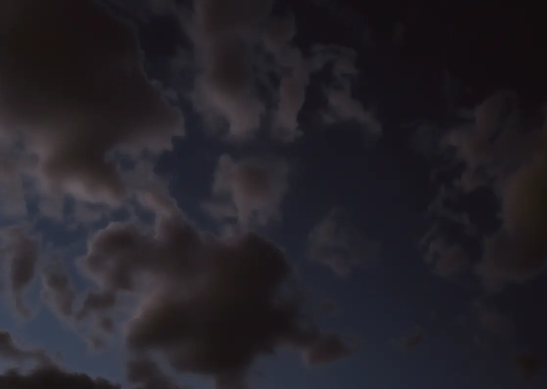 Dark clouds drifting across a night sky